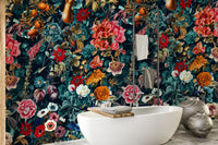 Floral wallpaper mural behind a luxury bathtub in a modern bathroom.