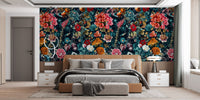 Moody Inky Floral Intrigue Wallpaper used as a bedroom feature wall.