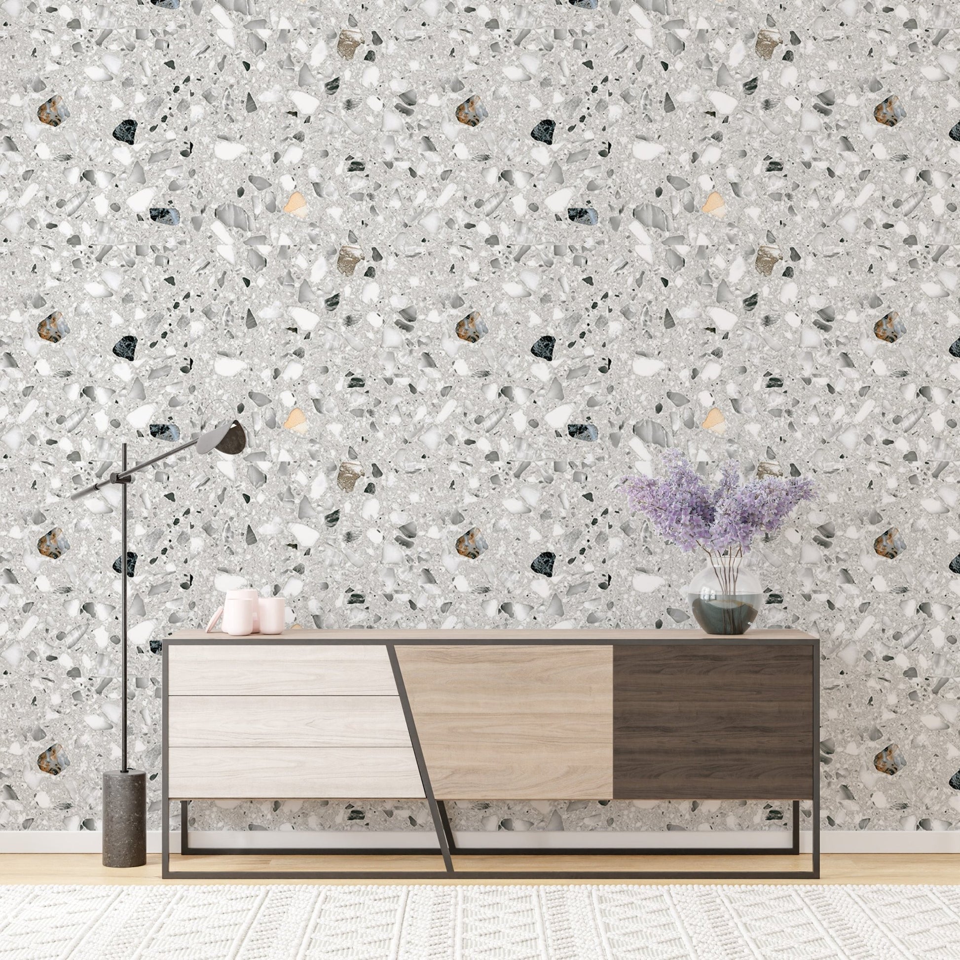 Italian style terrazzo flooring vector grey wallpaper behind a multi-tone sideboard.