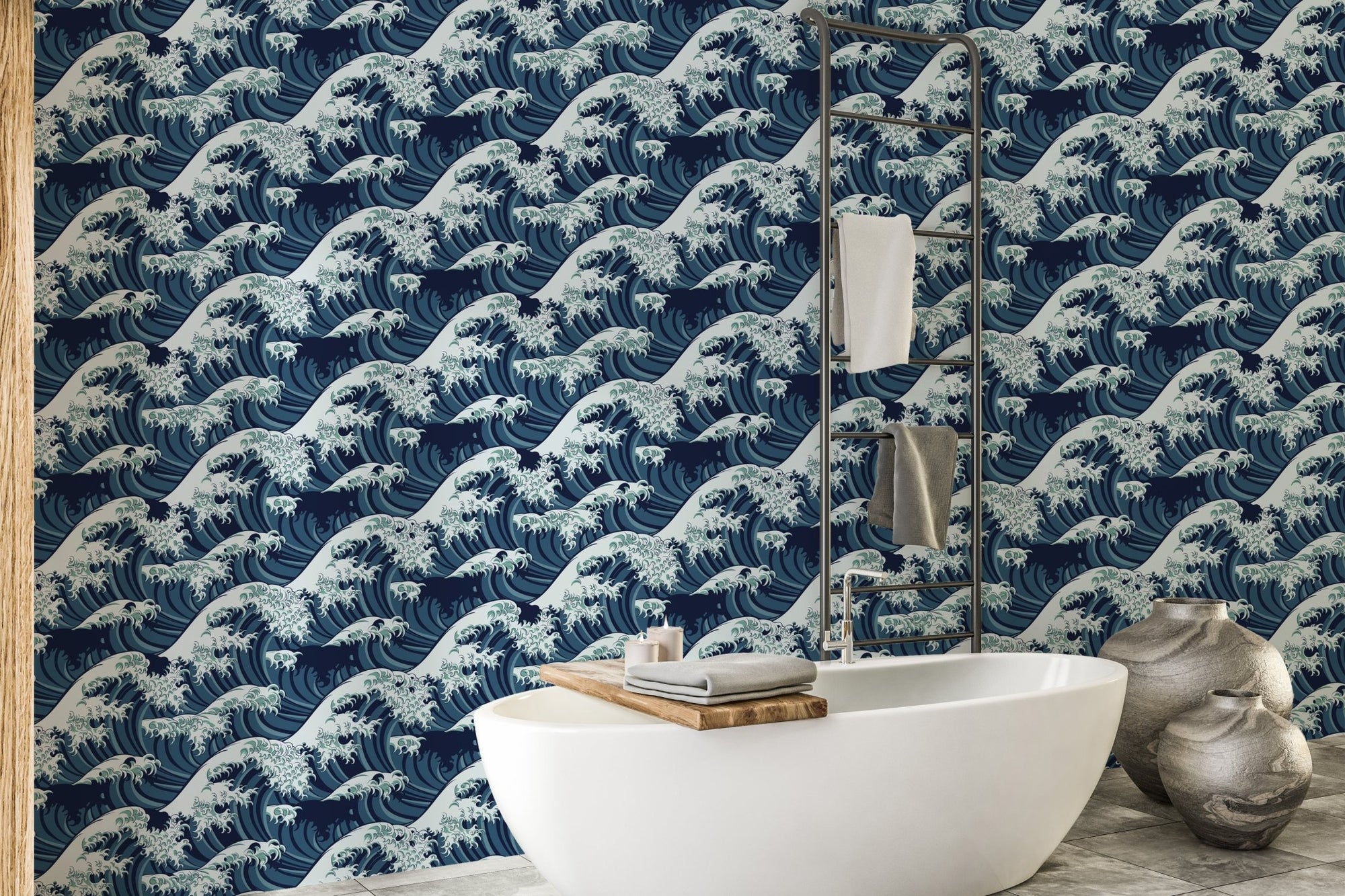 Japanese wave pattern wallpaper behind a white freestanding bathtub.