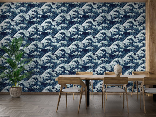 Navy blue wave wallpaper in a dining room with wooden table and chairs.