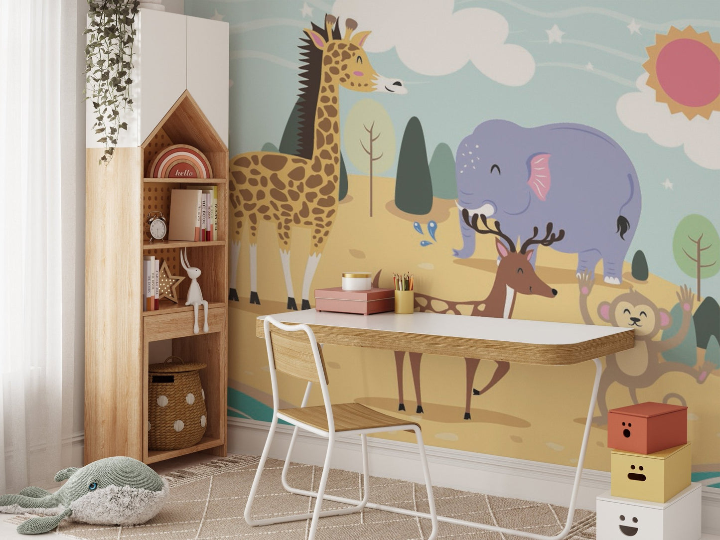 Large scale jungle animal wall mural behind a white wooden study desk.