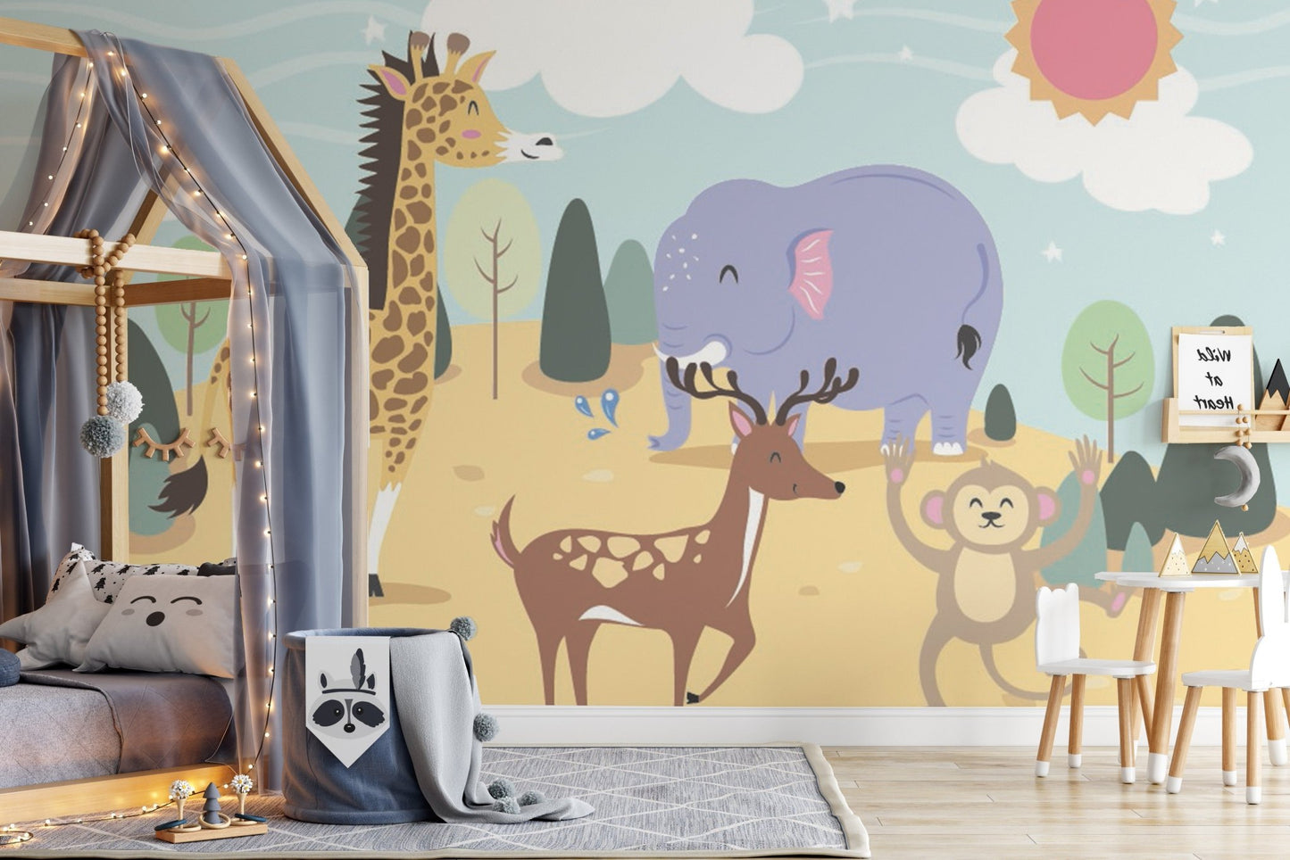 Toddler bedroom jolly wall mural showing a giraffe and purple elephant.
