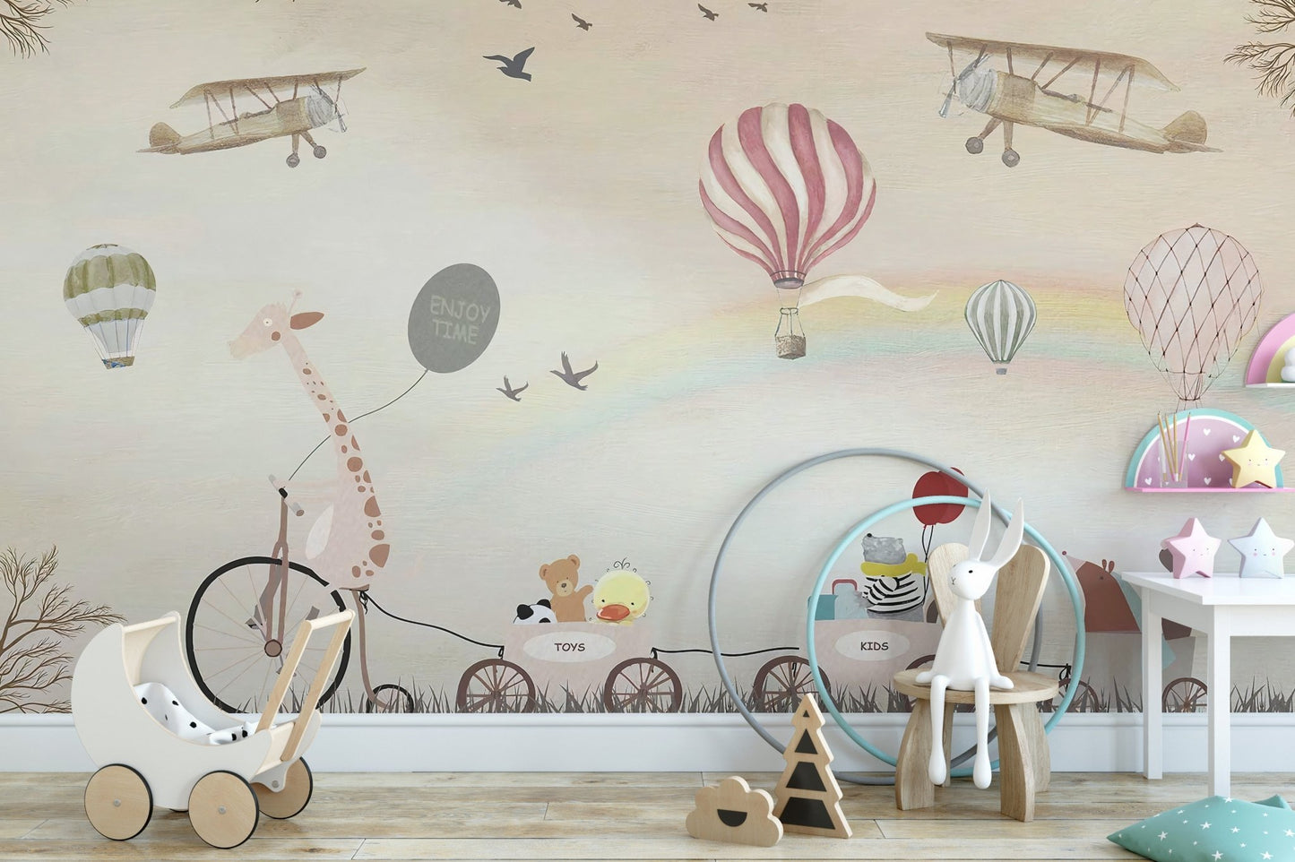 Neutral nursery wall mural with hot air balloons and animal train graphics.