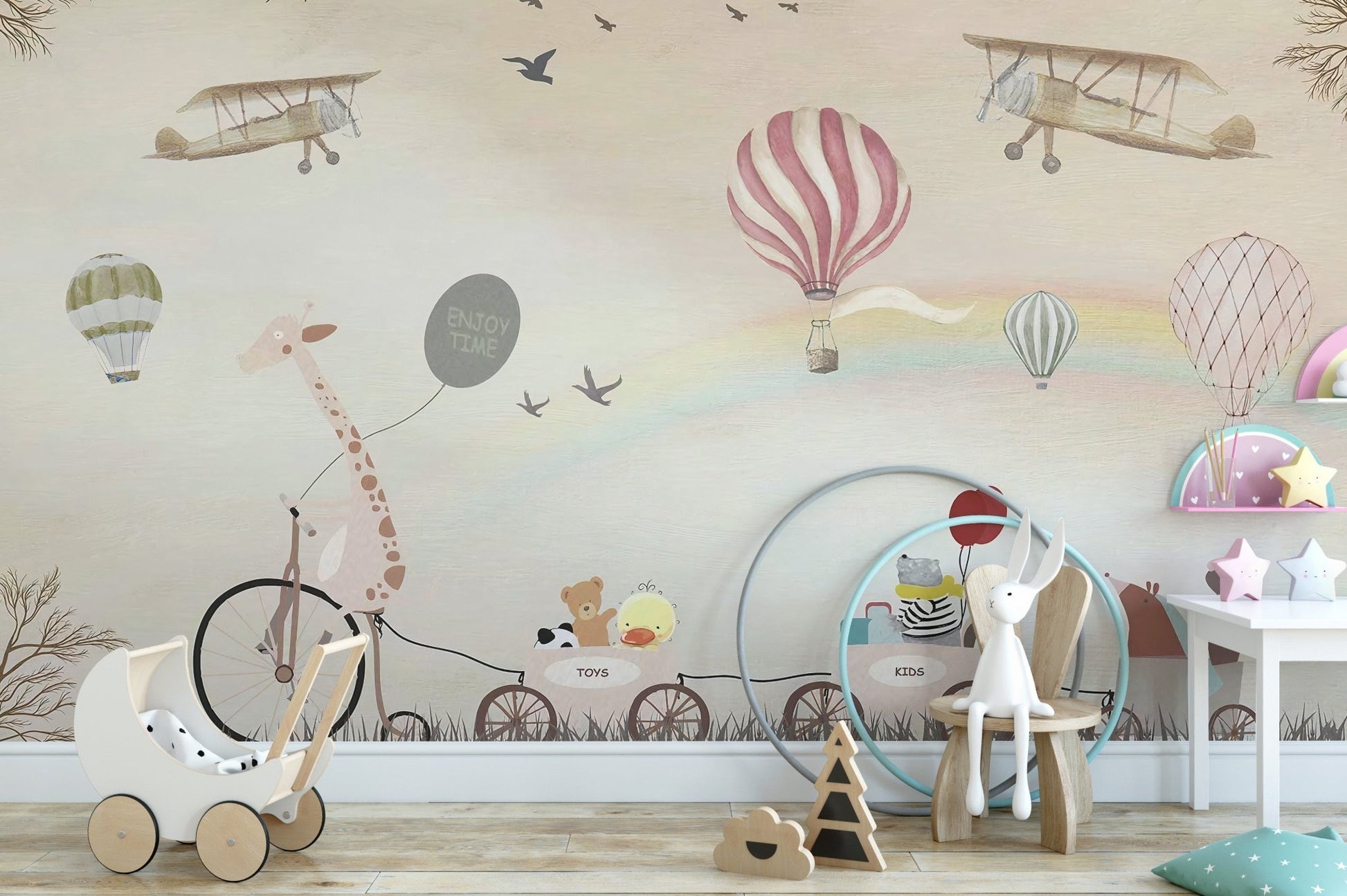 Neutral nursery wall mural with hot air balloons and animal train graphics.