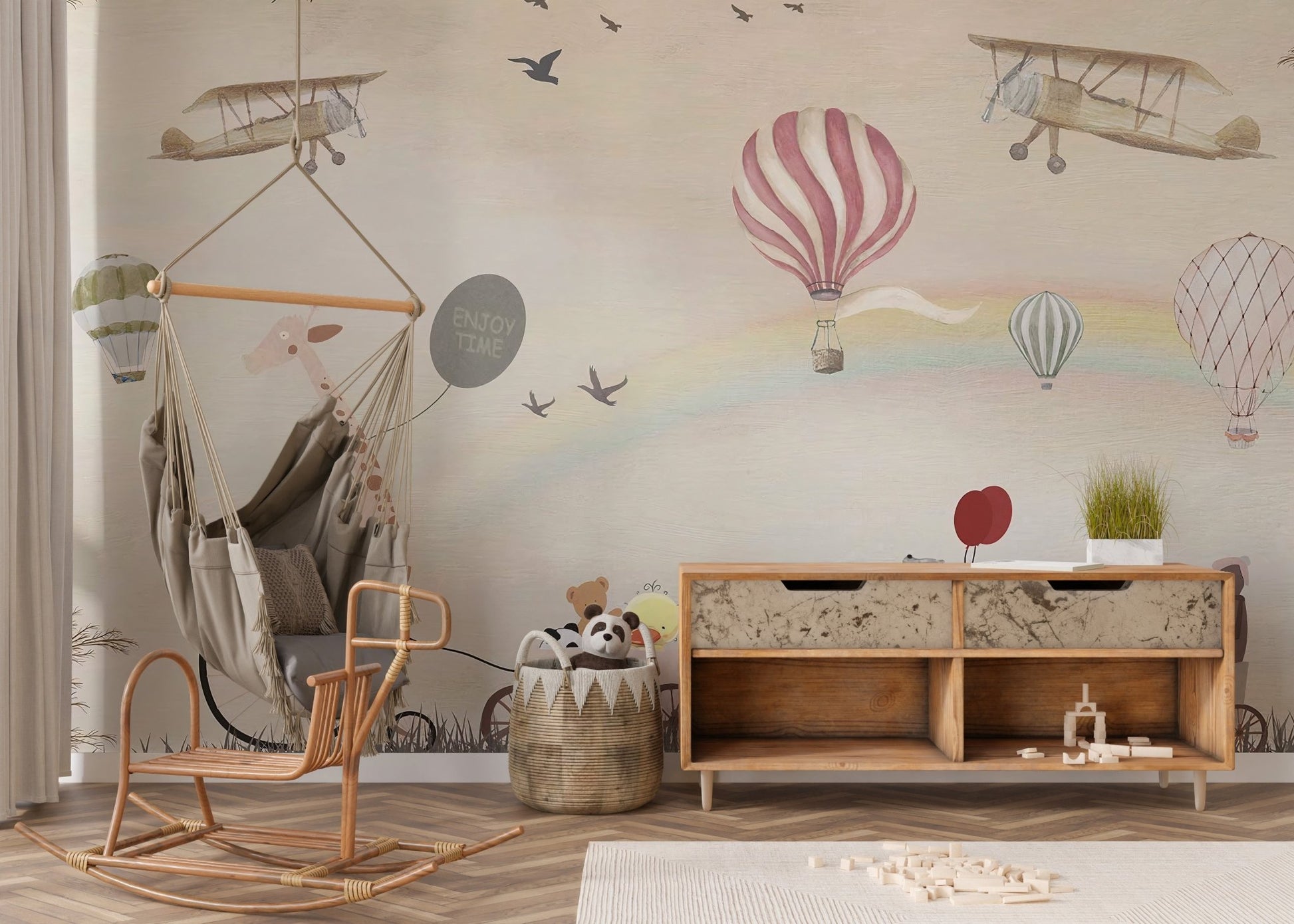 Neutral-toned jovial mural featuring a giraffe riding a bicycle and a hammock.