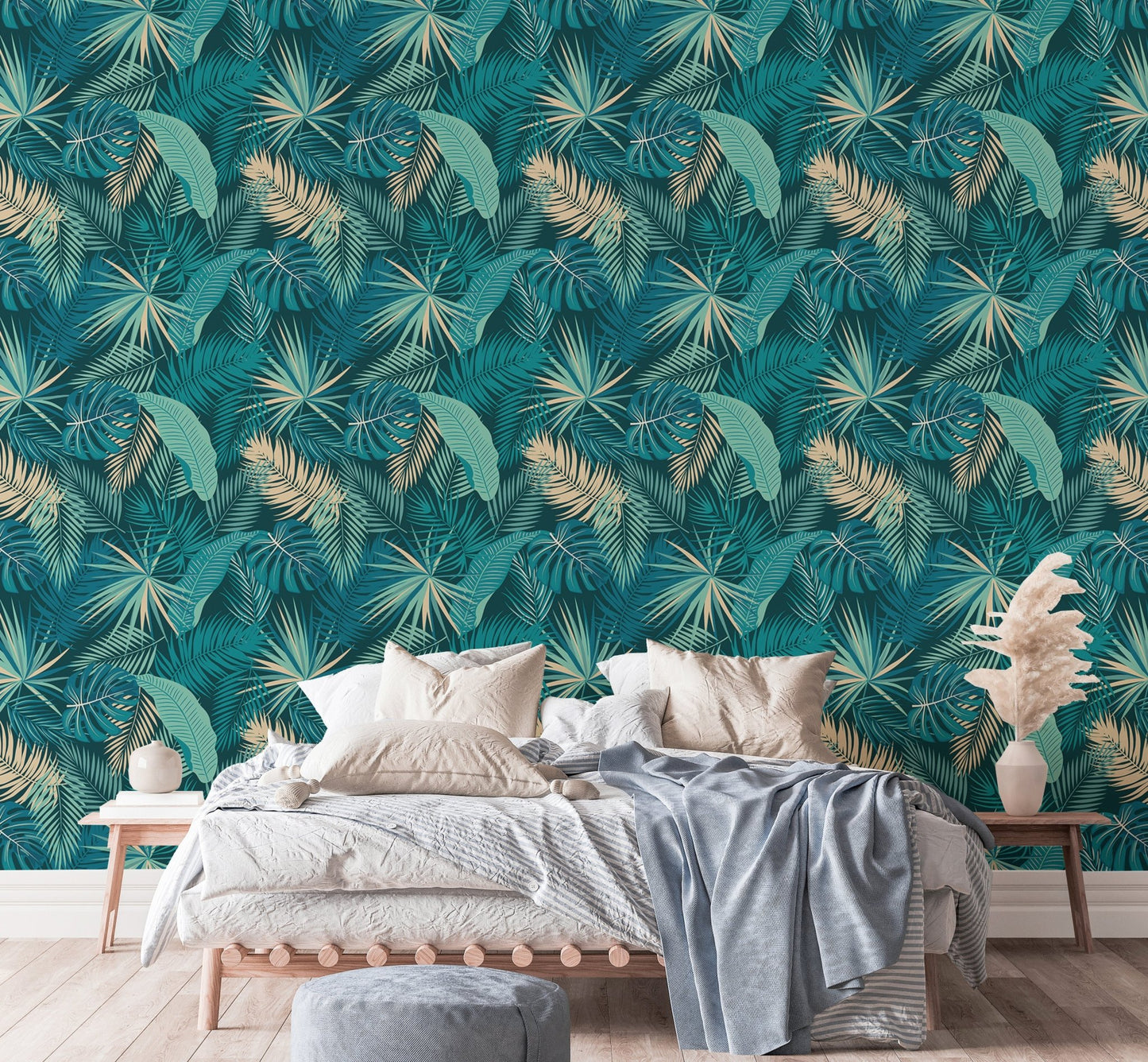 Bedroom featuring jungle palm leaves wallpaper behind a headboard.