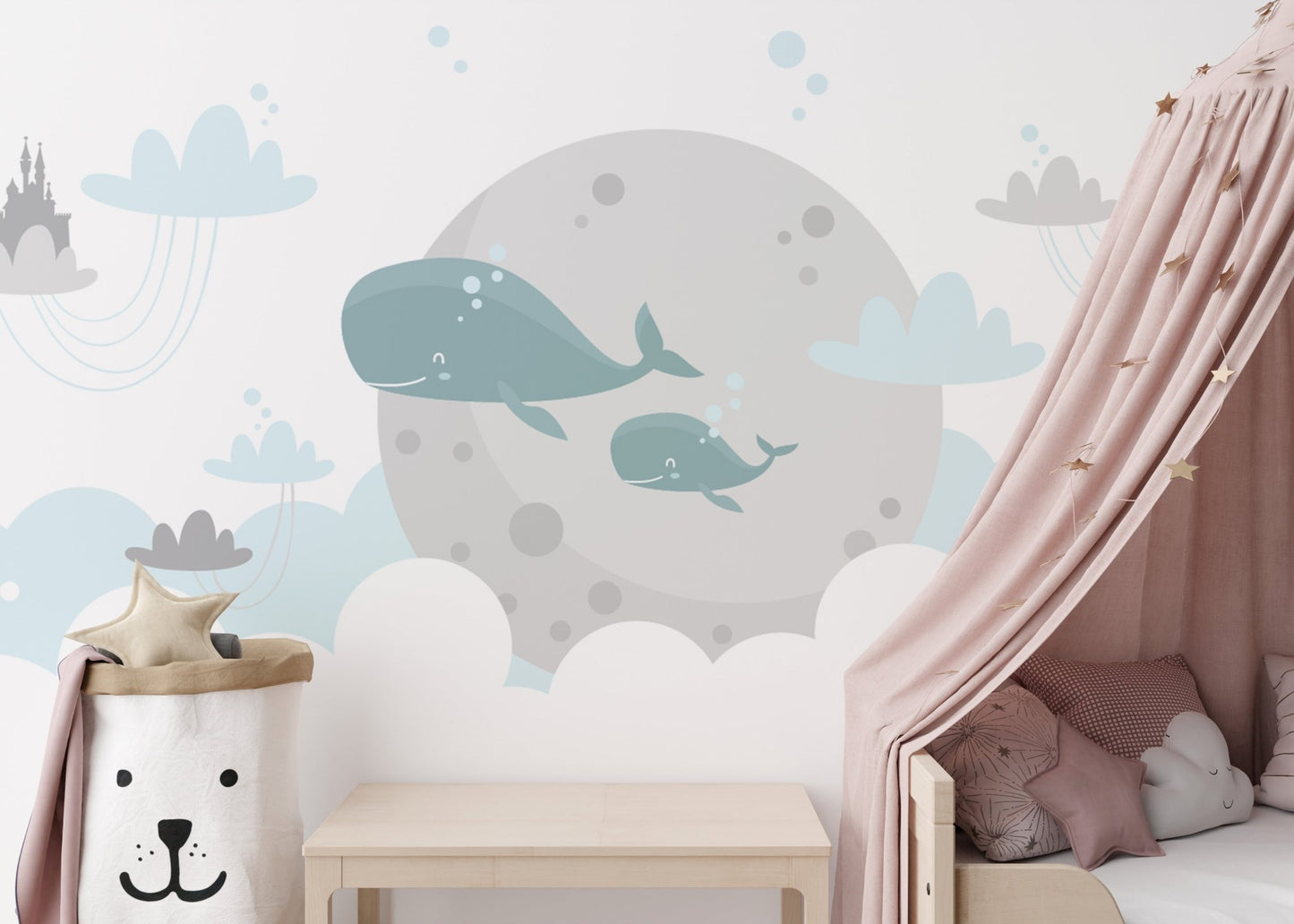 Pink nursery wall mural with whale pattern and pink canopy bed for kids