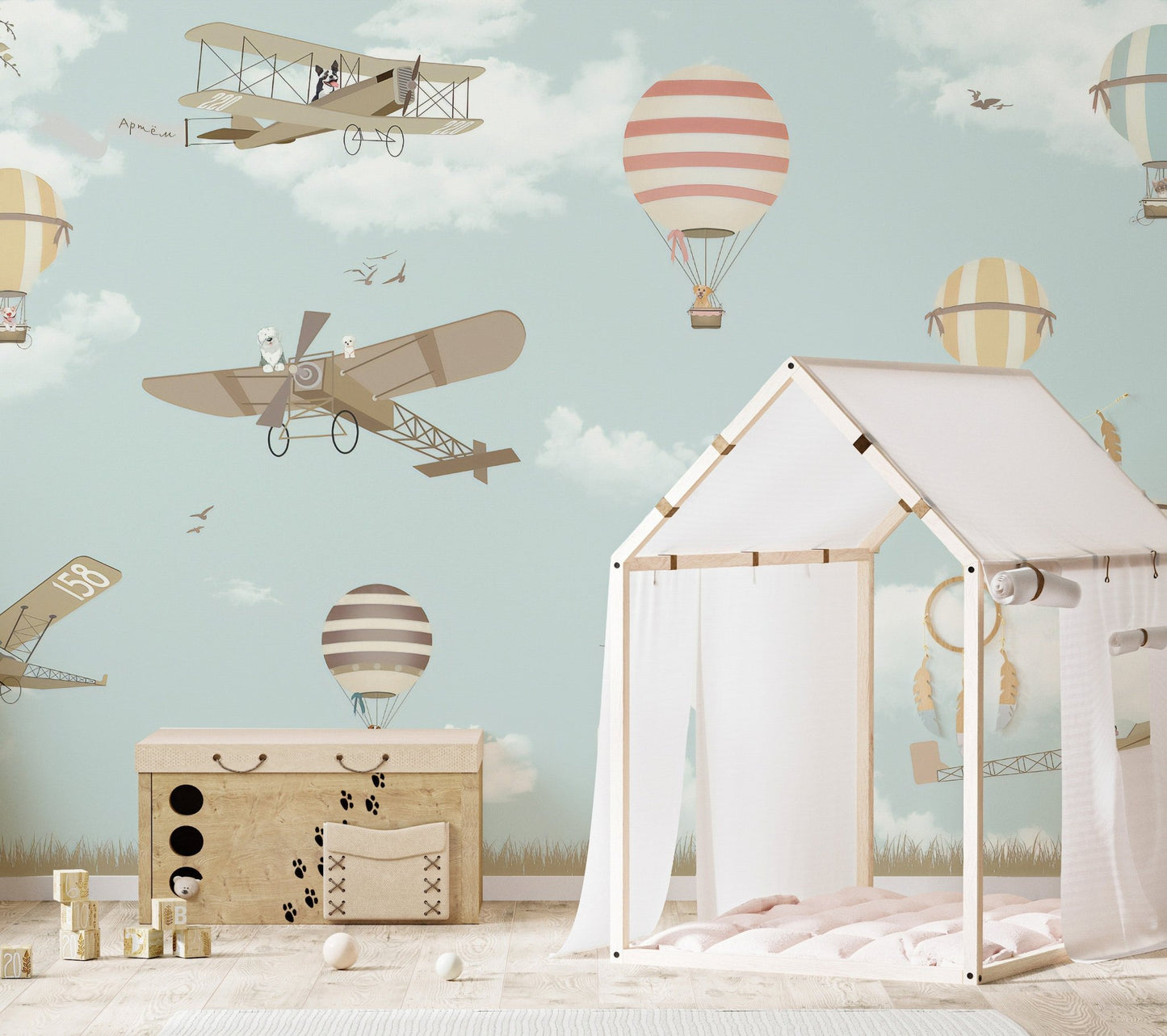 Hot air balloon wall mural with planes in nursery. 
