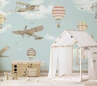 Hot air balloon wall mural with planes in nursery. 