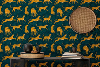 Leopard pattern wallpaper for a study space with a small side table.