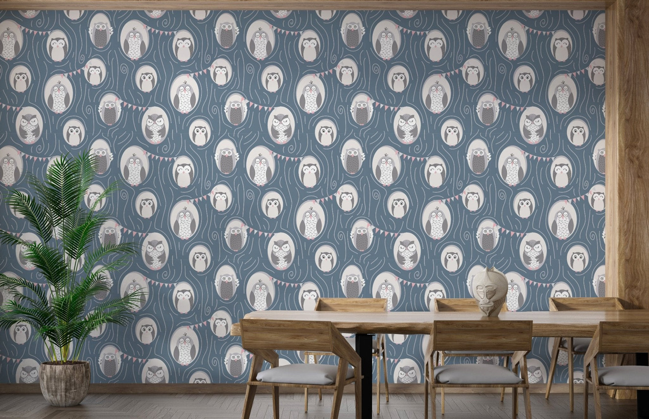 Repeating pattern wall mural with owls and tree designs for dining room.