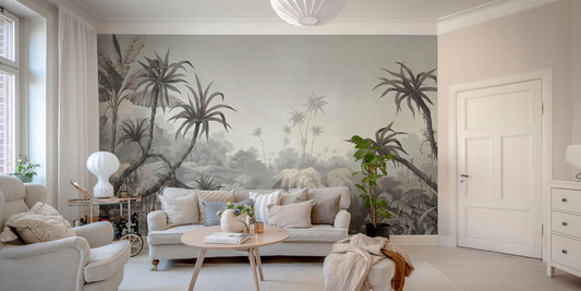 Monochrome tropical palm wall mural in a spacious living area with white furniture.