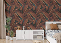 Nature leaves pattern wallpaper in a bedroom with a white console and bed.