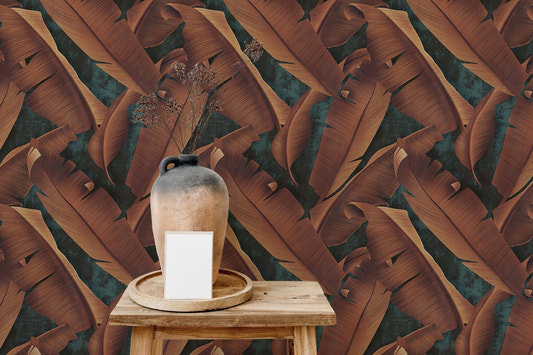 Brown autumn leaves wallpaper on a wooden table with a clay vase.