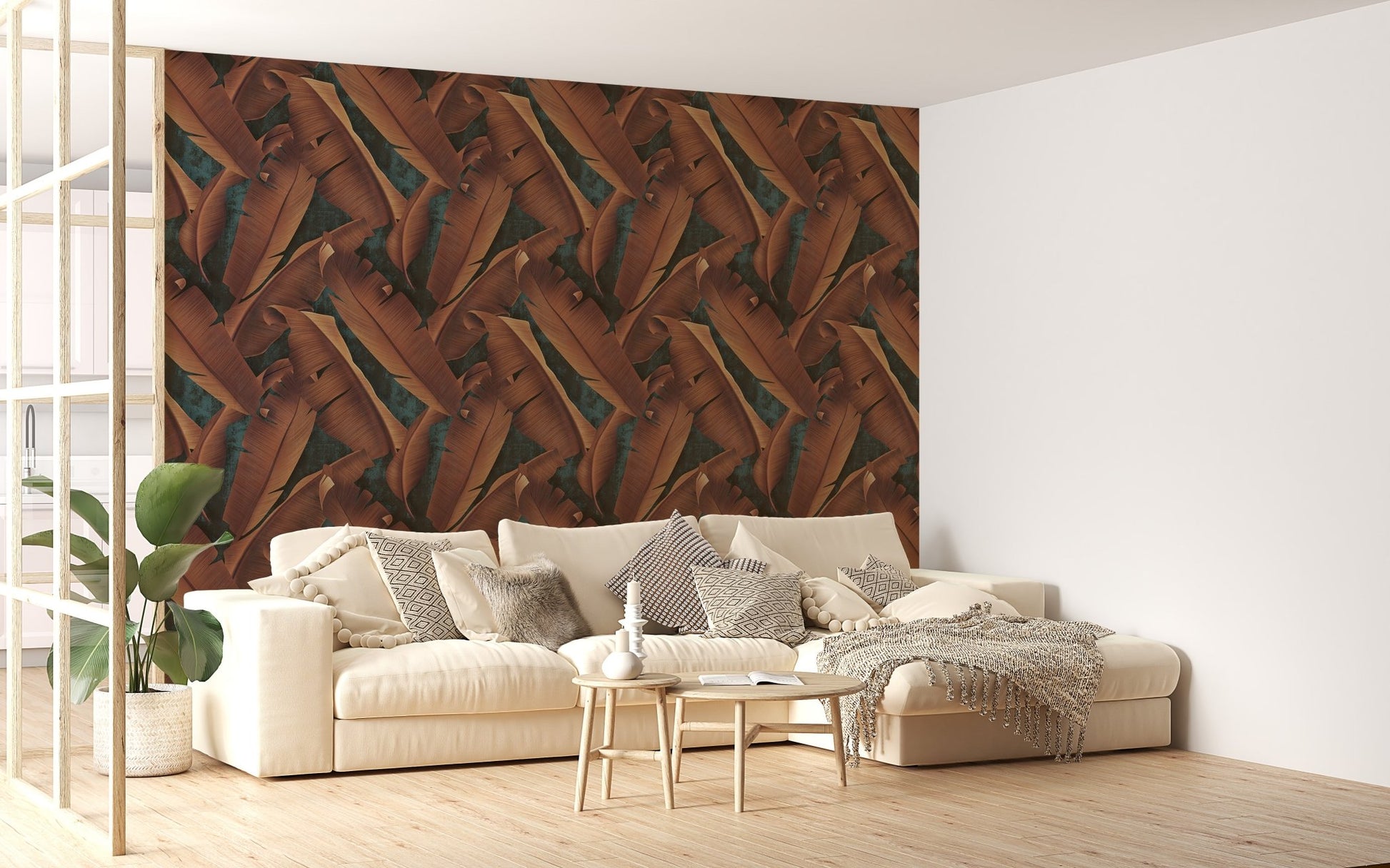 Leaves pattern wallpaper in a neutral lounge with a large cream sectional.