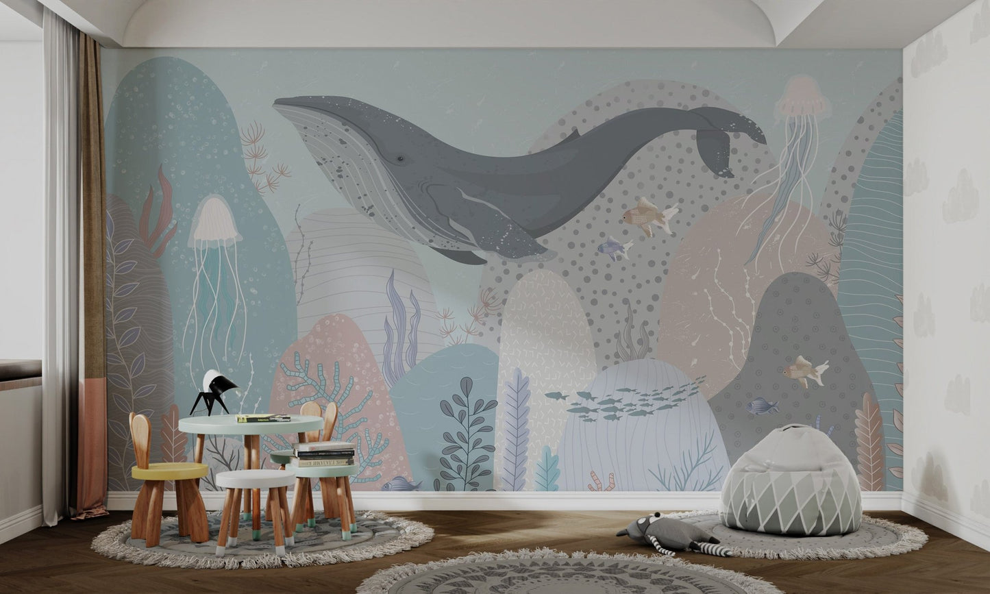 Nautical theme wall mural with jellyfish and coral in light blue for kids play area.