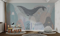 Nautical theme wall mural with jellyfish and coral in light blue for kids play area.