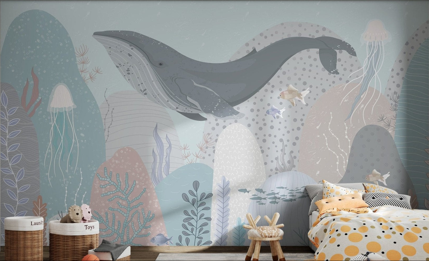 Whale-themed mural with jellyfish and fish in children's bedroom.