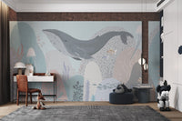 Minimalist ocean mural with a large whale for study area.