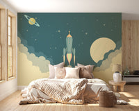 Modern bedroom featuring a space themed wall mural with a large rocket ship.