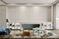 Subtle cream leaf wall mural for an understated kids playroom.