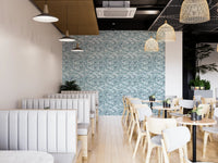Restaurant interior with blue leaves design wallpaper.