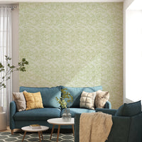 Light green leaf pattern wallpaper in modern living space.