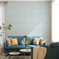 Leaves In Deep Sky Blue Wallpaper in a living area.