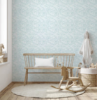 Sky blue wallpaper in a nursery interior.