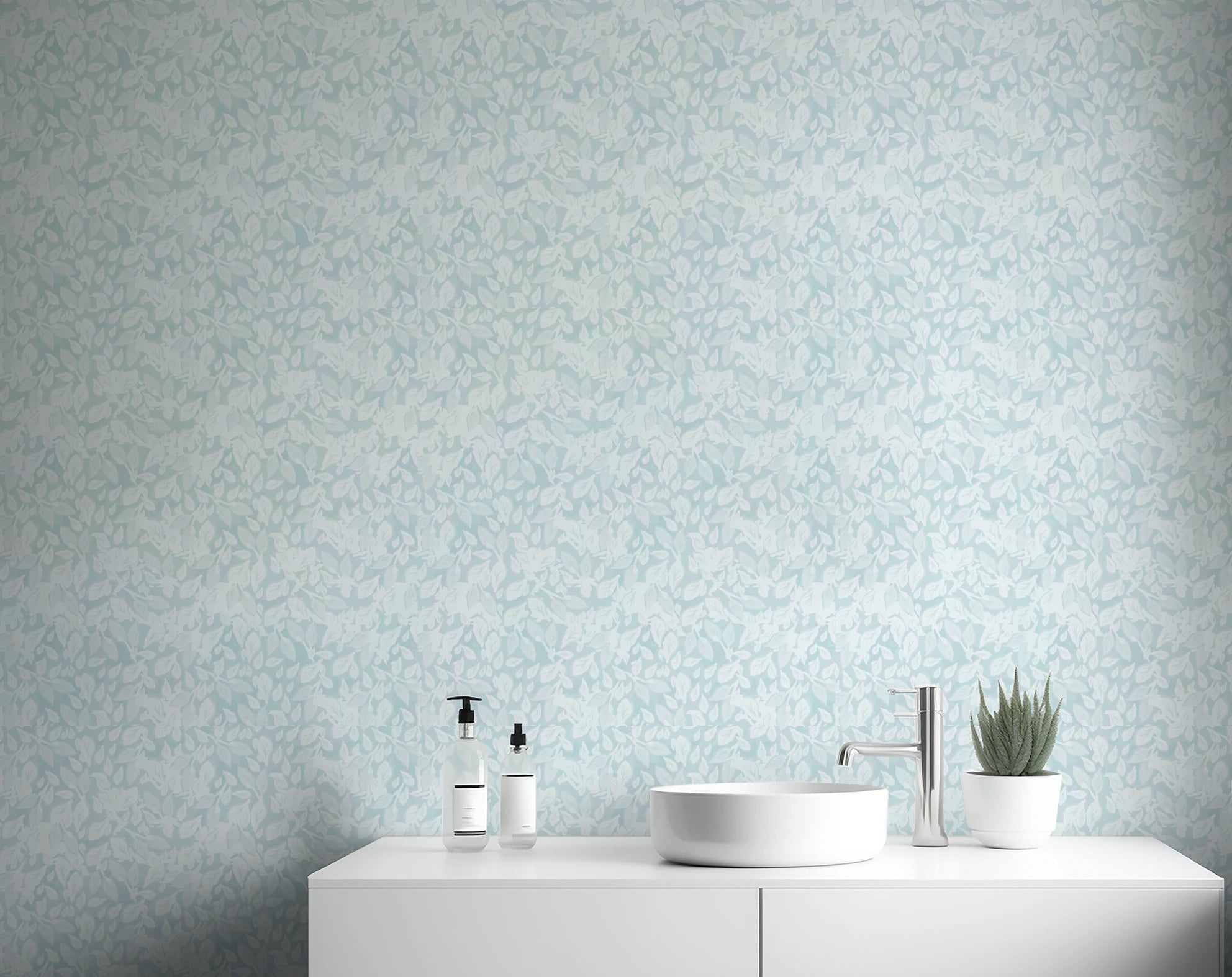 Leaves In Deep Sky Blue Wallpaper behind a white bathroom.