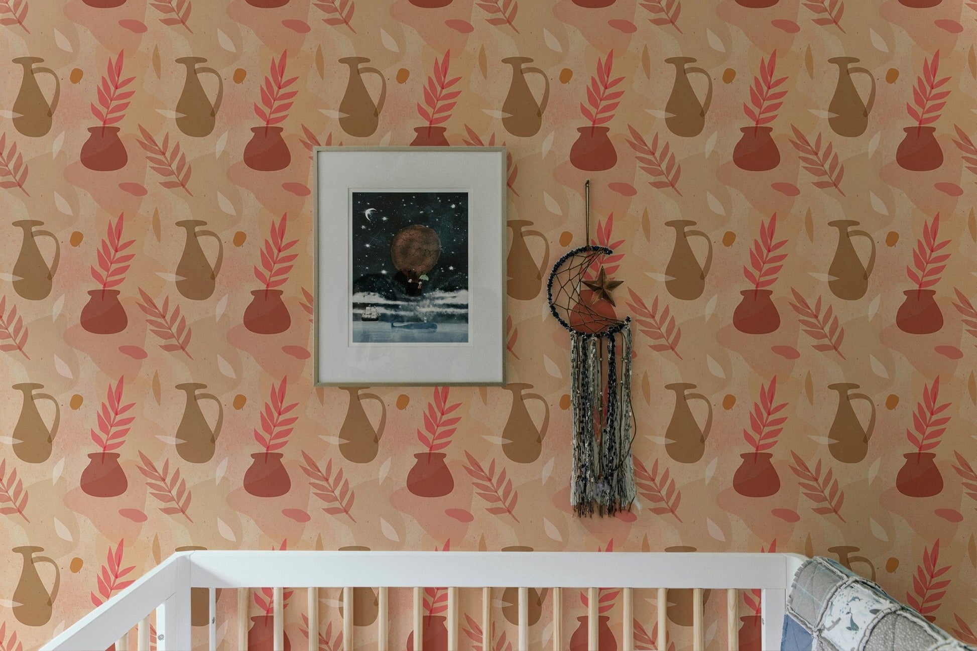Nursery room featuring a vintage pitcher and botanical leaf wallpaper.
