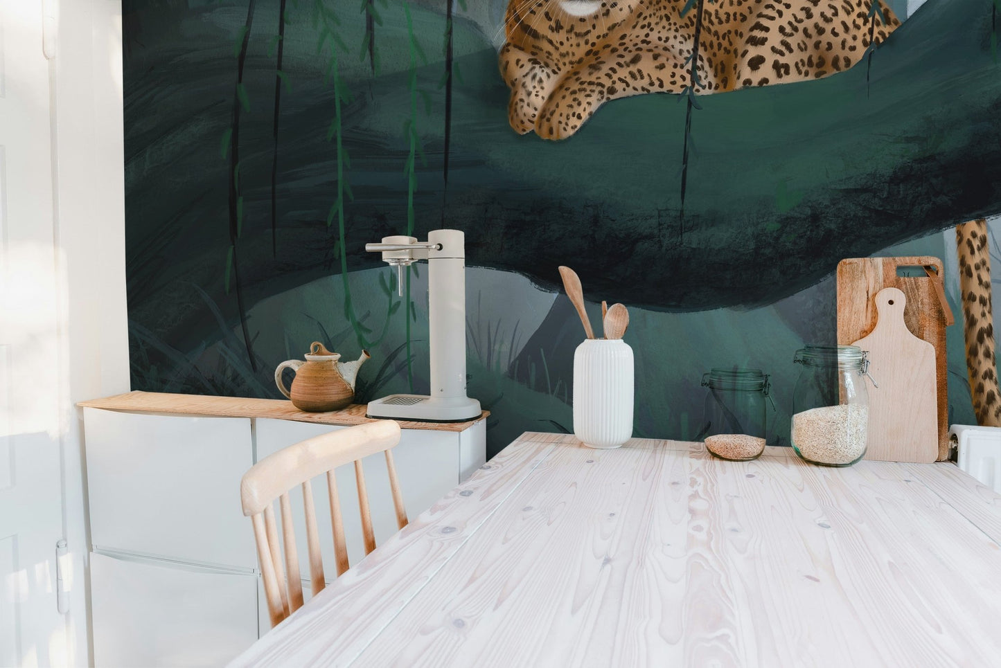 Jungle wall mural featuring spotted leopard and deep green foliage.