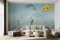 Marine life mural with a submarine, coral reefs in bright living room.