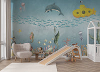 Large school of small blue fish swimming in sea mural for nursery.