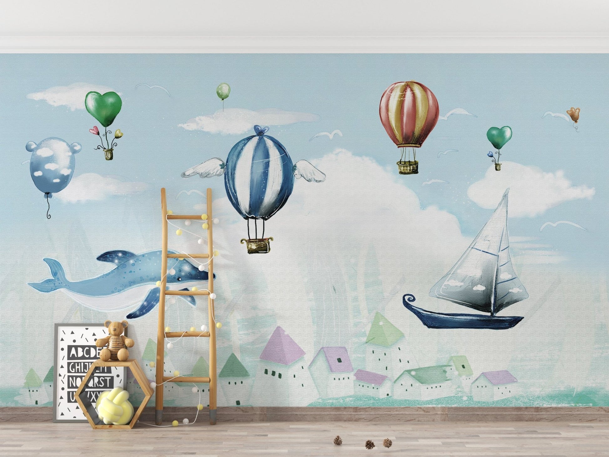 Light Blue Balloon Whale Wall mural with sailboats and pastel mountains.