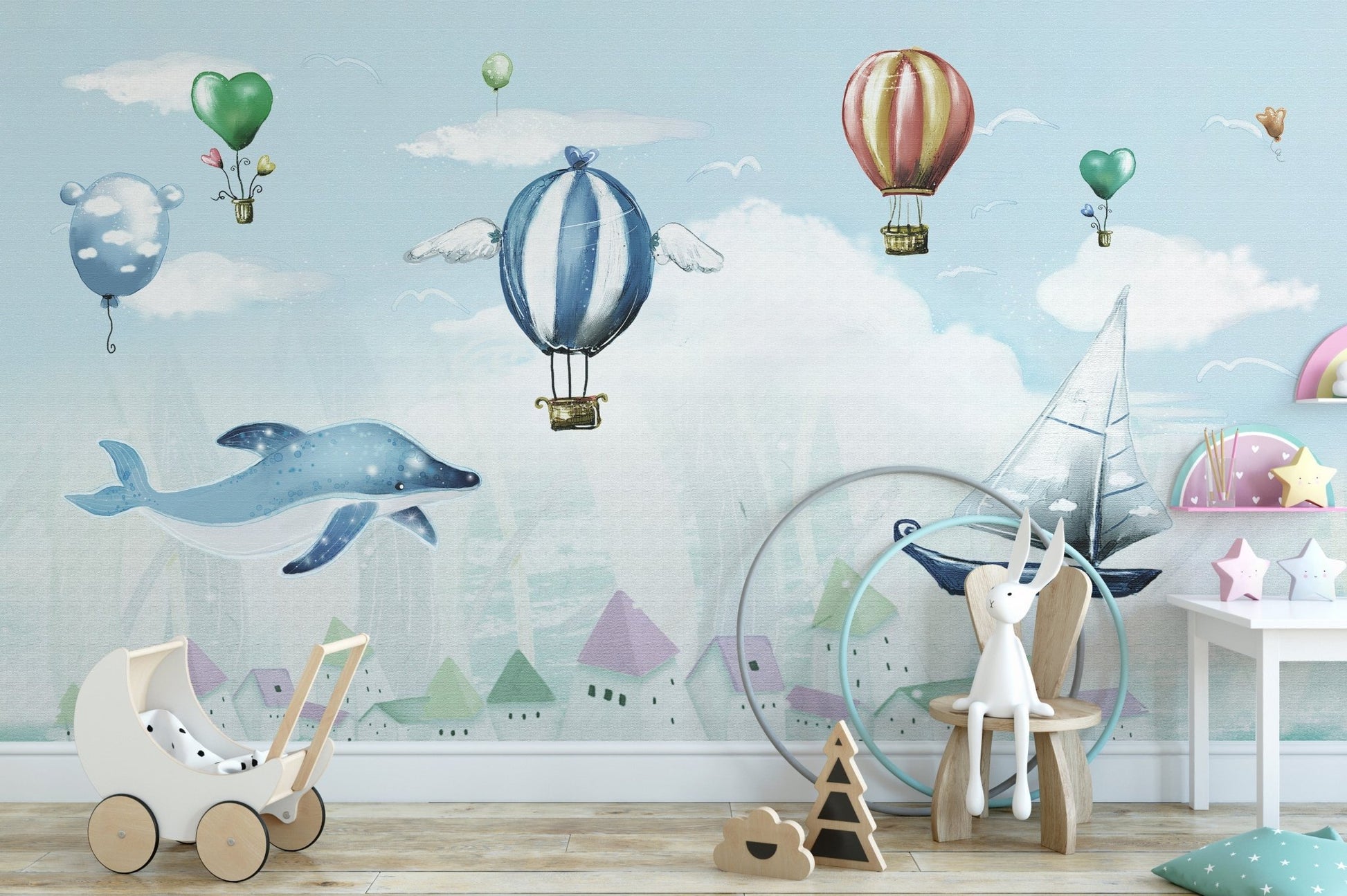 Kids room wall mural featuring a flying blue whale and clouds.