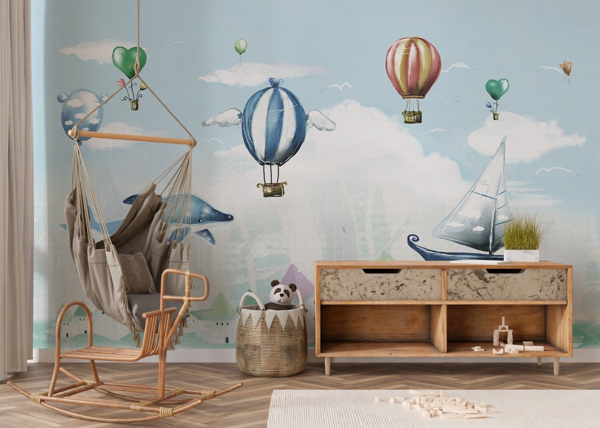 Blue hot air balloon wall mural for a modern nursery setting.