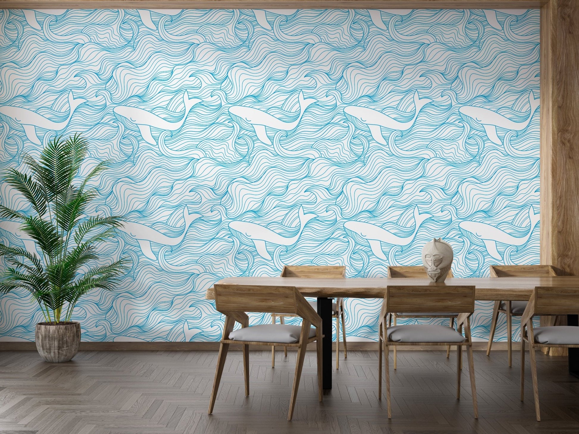 Nautical theme wallpaper featuring whales in a dining room with wooden furniture.