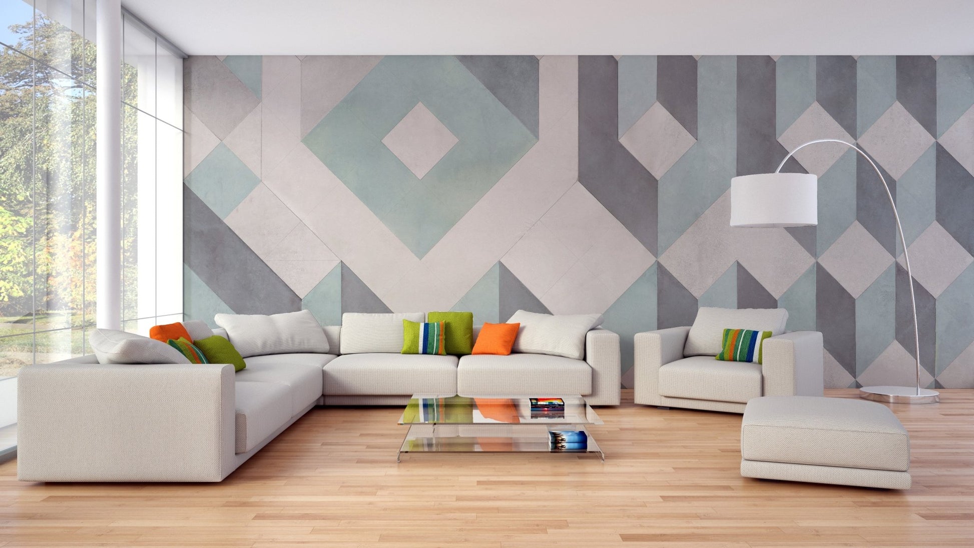 White sectional sofa in a bright lounge with a green and grey linear wall mural.
