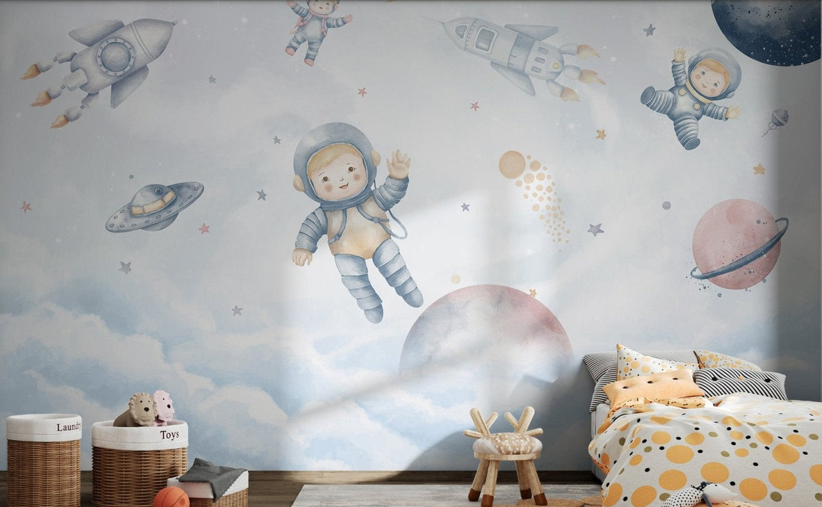 Watercolor little astronaut floating in space wall mural for kids bedroom.