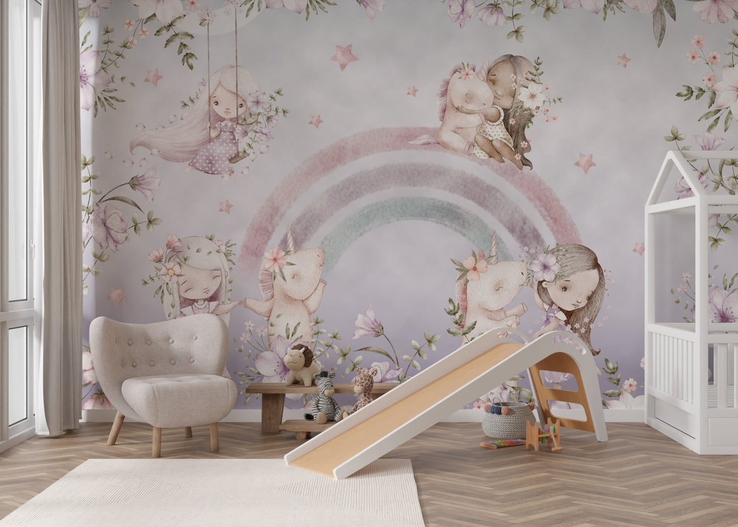 Nursery wall mural with unicorns, playful children and pastel rainbows.