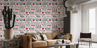 Modern love theme wallpaper mural with handwritten phrases and hearts.