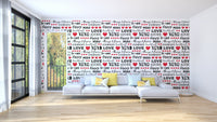 Artistic love typography wallpaper mural with black script details.