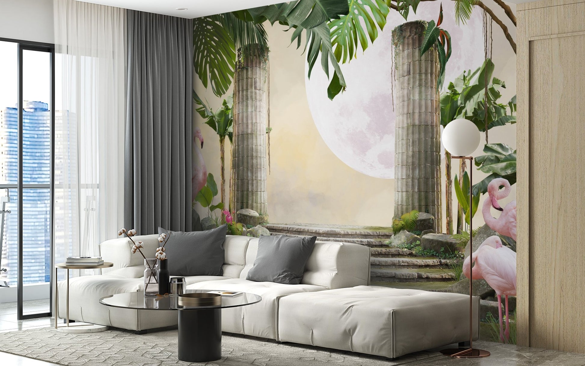Exotic jungle paradise wall mural behind a grey sofa in a brightly lit apartment living room.