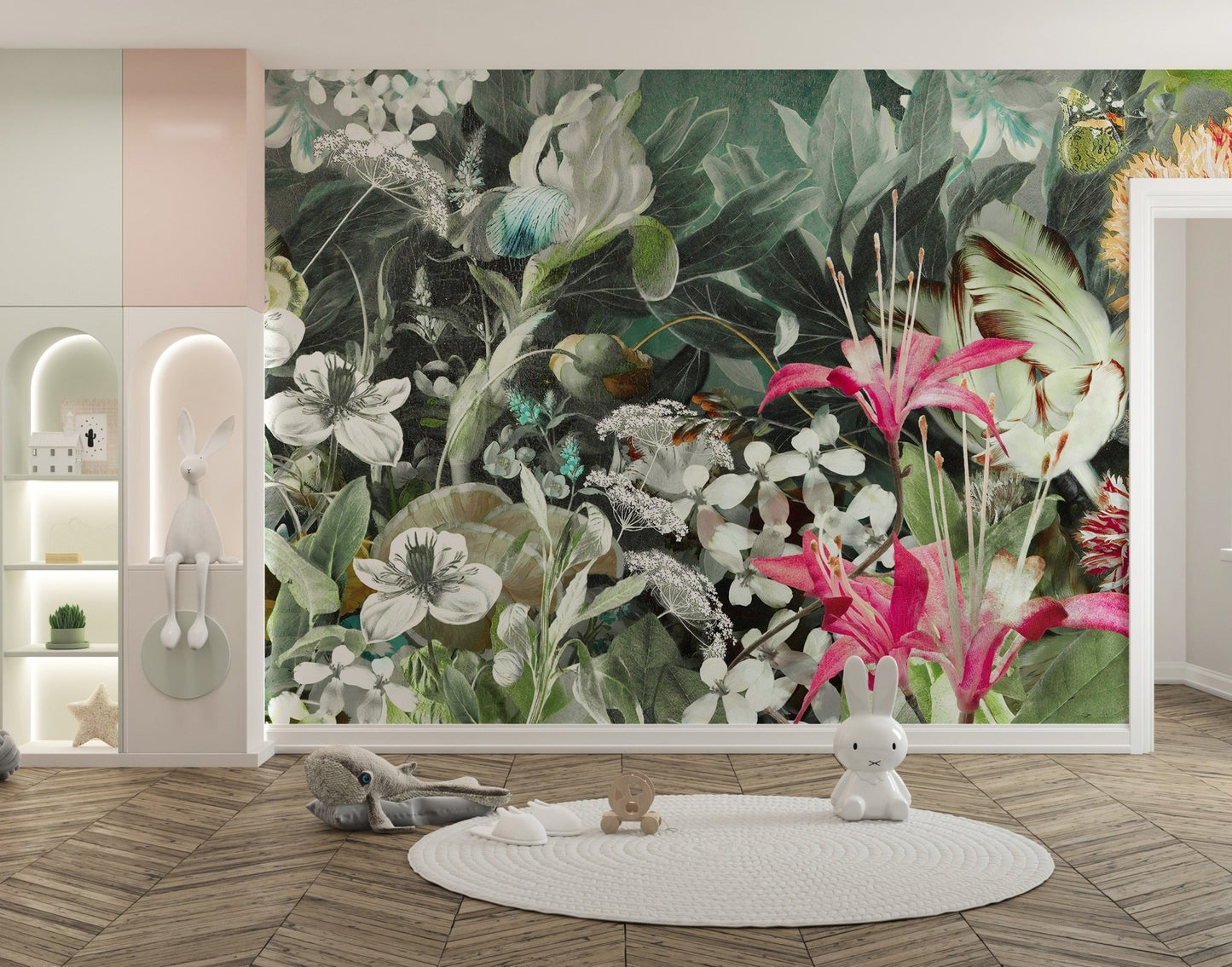 Kids play area with white circular rug and green floral wall mural.