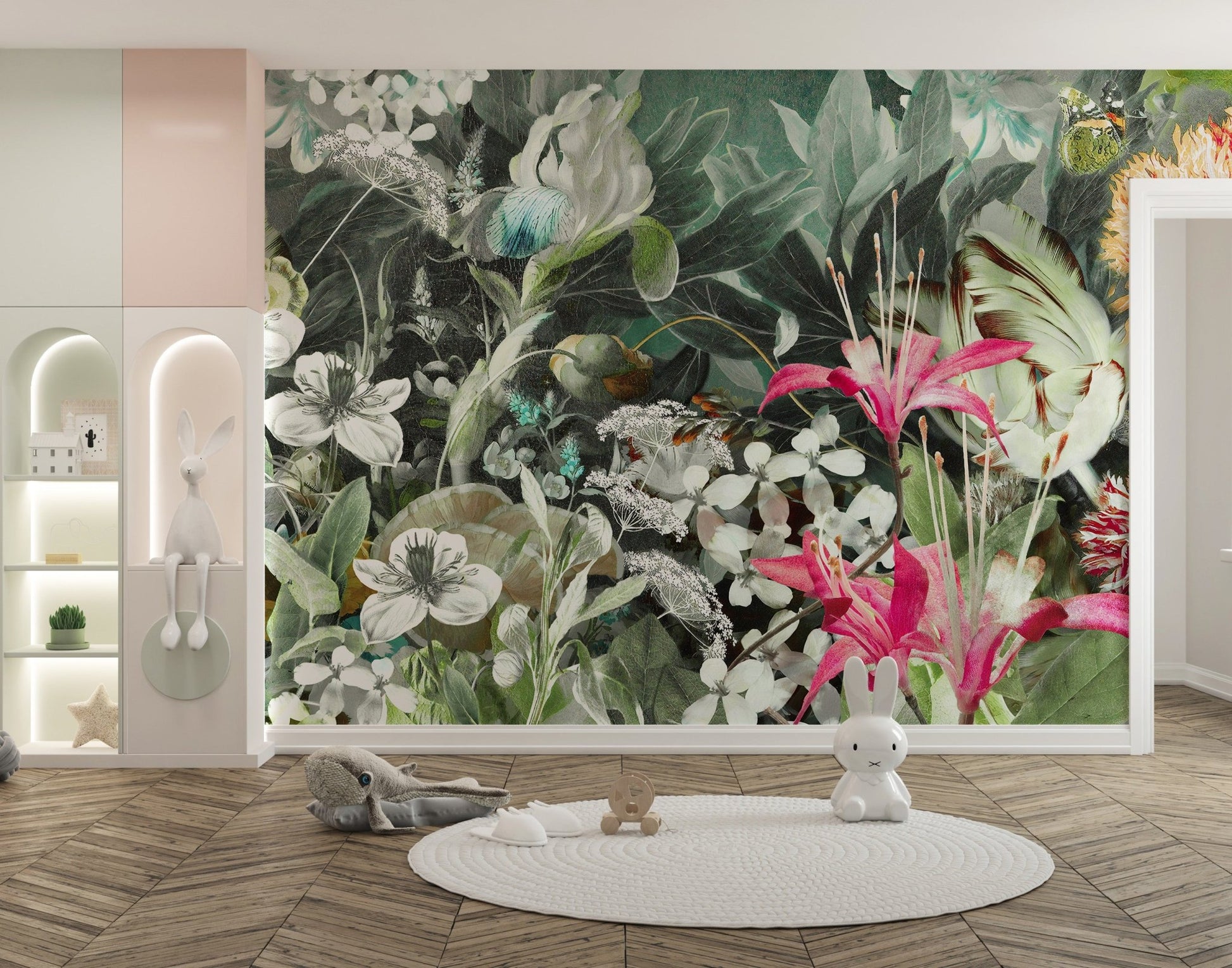 Kids play area with white circular rug and green floral wall mural.