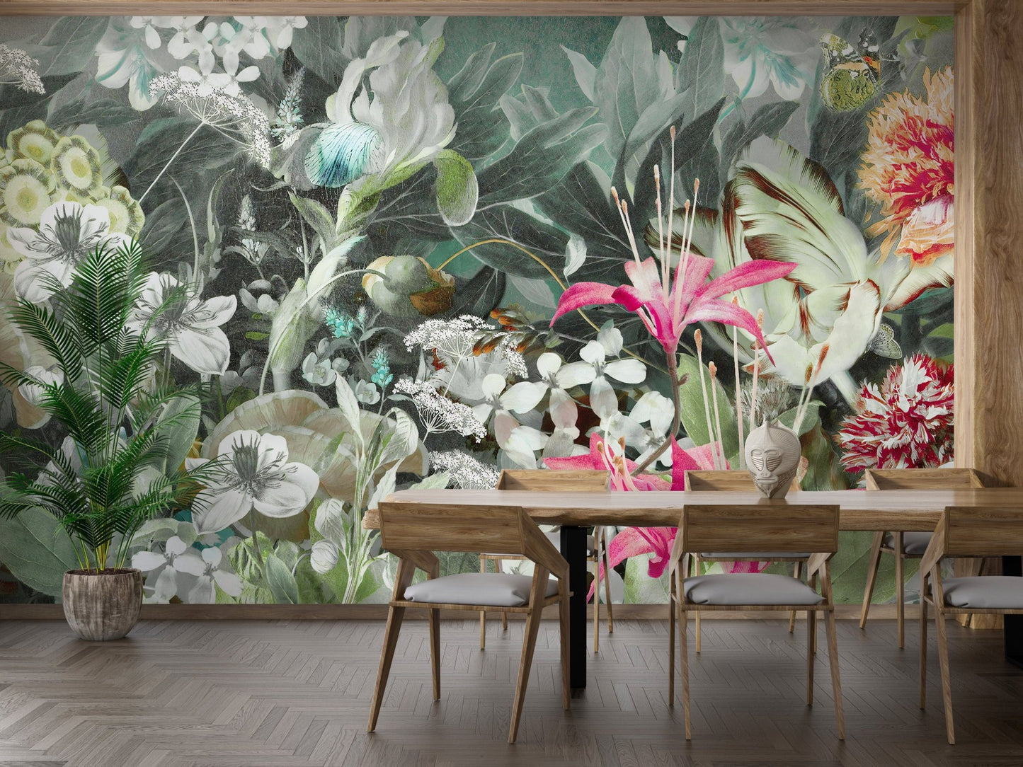 Dining room wooden table set against dark green oasis wall mural background.