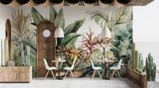 Lush greenery wall mural with tropical leaves in soft green tones.