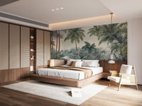 Green lush jungle wall mural in master bedroom with wooden bed frame and neutral rug.